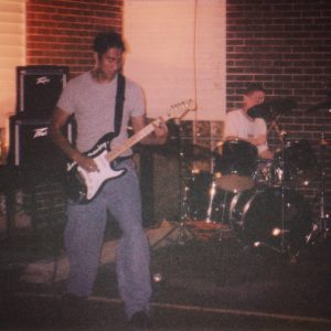 CK rocking out on electric guitar